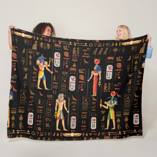 Gold Egyptian hieroglyphs and deities on black  Fleece Blanket