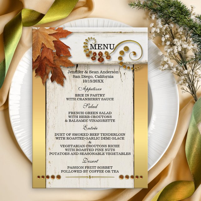 Gold Fall Leaves Wedding Menu Card (Boho chic wedding menu featuring colorful fall leaves on rustic wood and stylish gold)