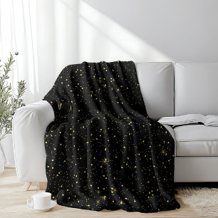 Gold faux glitter and sparkles on black fleece blanket