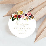Gold Feather Boho Floral Thank You Wedding Favor   Classic Round Sticker<br><div class="desc">This gold feather boho floral minimalist thank you wedding favor classic round sticker is perfect for a rustic wedding. The design features hand-painted brown wild feathers, boho yellow, white, purple, pink, blush, burgundy flowers and blue berries neatly arranged into beautiful bouquets. Make the sticker labels your own by including your...</div>