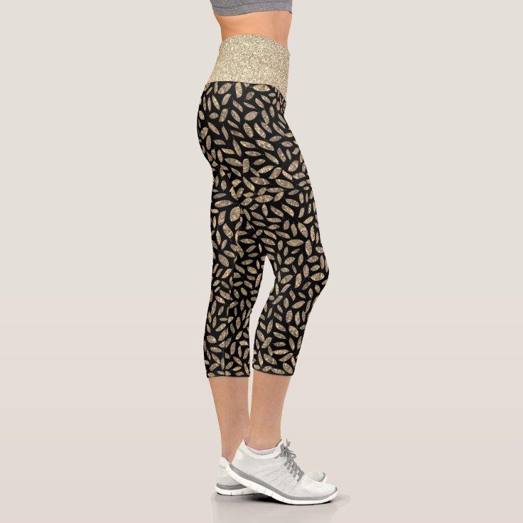 Gold feathers on black capri leggings Zazzle
