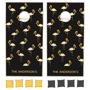 Gold flamingo pattern black beach family name cornhole set