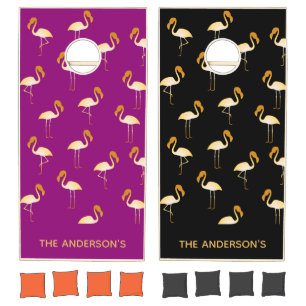 Gold flamingo pattern black pink family name cornhole set