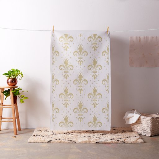 Gold fleur-de-lis seamless pattern on white fabric