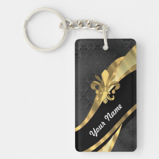 Gold fleur de lys on black keychain