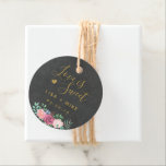 Gold Floral Love is Sweet Wedding Chalkboard Round Favor Tags<br><div class="desc">Custom-designed wedding favor round tags featuring "love is sweet" in modern hand calligraphy and pink floral bouquet on chalkboard texture background. Personalize with bride and groom's names and wedding date. Attach these labels on boxes,  bags,  or jars for unique DIY wedding candy favors/gifts.</div>