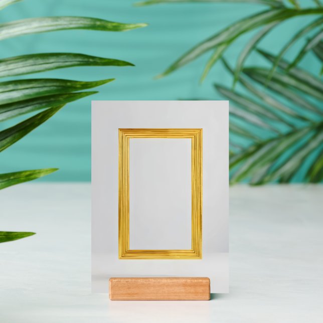 gold framed picture is on a gray wall holder (Insitu 2)