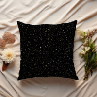Gold glitter and sparkles on black