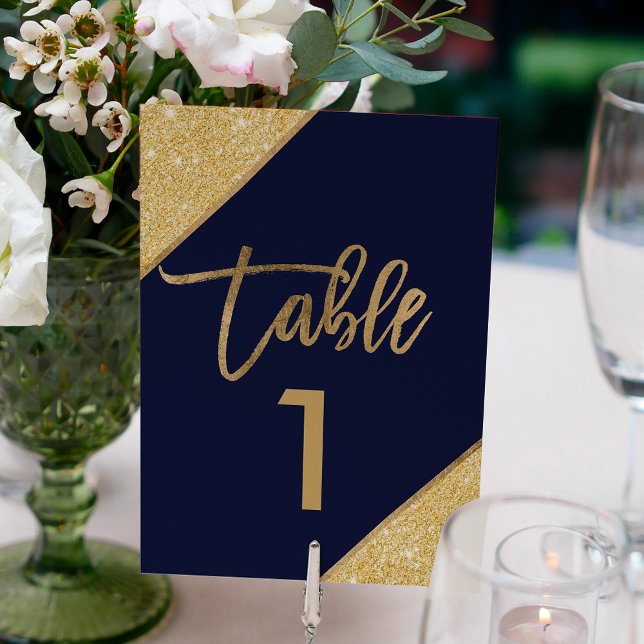 Gold glitter script navy blue table number (Creator Uploaded)