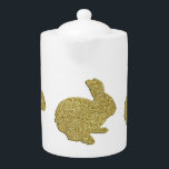 Gold Glitter Silhouette Easter Bunny Teapot<br><div class="desc">This modern and fun teapot is perfect for enjoying a relaxing cup of tea while at work or at home. Also good for serving coffee during dessert when you have guest over. This teapot is sure to look lovely with any décor. Makes a great gift for weddings, birthdays, mother's day,...</div>