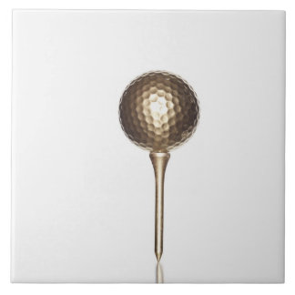 Gold golf ball and tee ceramic tile