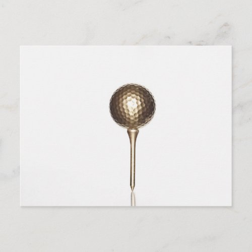 Gold golf ball and tee postcard