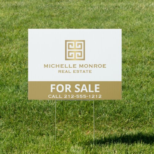 Gold Greek Key on White Real Estate For Sale Rent Sign