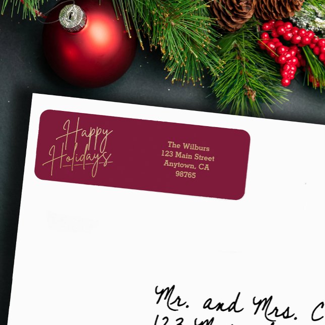 Gold Happy Holidays Cranberry Return Address Label (Gold script Happy Holidays on small cranberry horizontal return address labels)