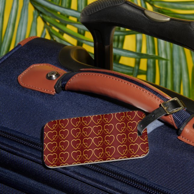 Gold hearts on maroon luggage tag (Front Insitu 3)