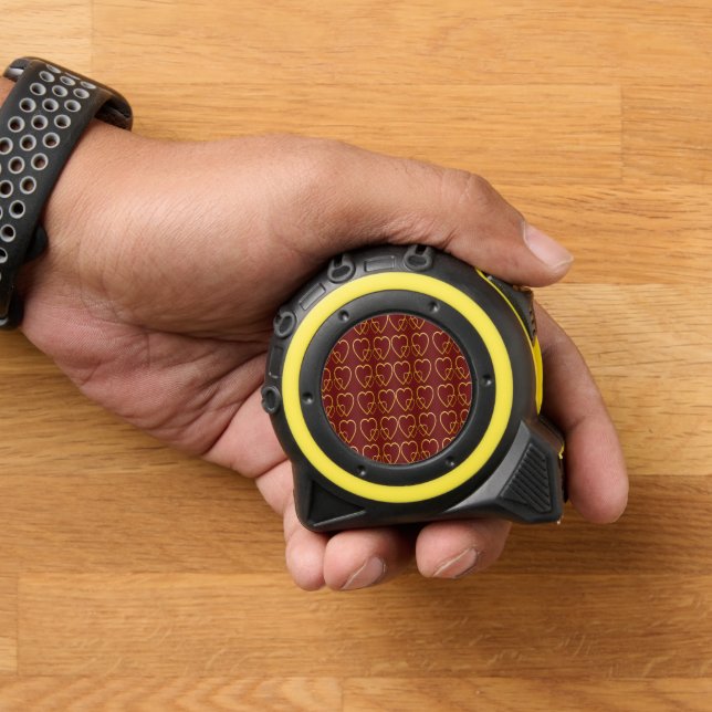Gold hearts on maroon tape measure (Home)