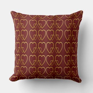 Gold hearts on maroon