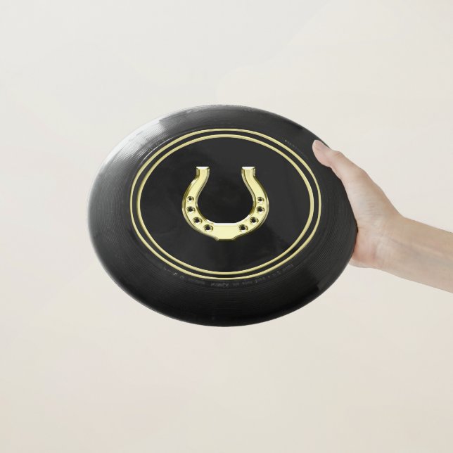 Gold Horseshoe Wham-O Frisbee (In Hand)