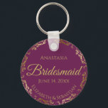 Gold Lace Bridesmaid Wedding Gift Cassis Purple Keychain<br><div class="desc">These keychains are designed to give as favors to bridesmaids in your wedding party. They feature a simple yet elegant design with a cassis purple, magenta, or berry colored background, gold lettering, and a golden faux foil floral lace border. Perfect way to thank your bridesmaids for being a part of...</div>