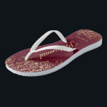 Gold Lace Burgundy Maroon Bridesmaid Wedding Flip Flops<br><div class="desc">These elegant wedding flip flops are a great way to thank and recognize your bridesmaids, while giving their feet a rest after a long day. The beautiful design features an elegant design with golden lace frills on a burgundy, maroon, or wine red colored background and fancy gold colored script lettering....</div>