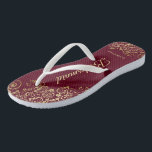 Gold Lace Burgundy Maroon Bridesmaid Wedding Flip Flops<br><div class="desc">These elegant wedding flip flops are a great way to thank and recognize your bridesmaids, while giving their feet a rest after a long day. The beautiful design features an elegant design with golden lace frills on a burgundy, maroon, or wine red colored background and fancy gold colored script lettering....</div>