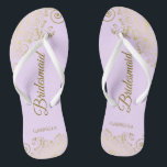 Gold Lace Elegant Lilac Purple Bridesmaid Wedding Flip Flops<br><div class="desc">These elegant wedding flip flops are a great way to thank and recognize your bridesmaids, while giving their feet a rest after a long day. The beautiful design features an elegant design with golden lace frills on a lilac, lavender, or pale purple colored background and fancy gold colored script lettering....</div>