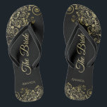 Gold Lace on Black The Bride Elegant Wedding Flip Flops<br><div class="desc">Dance the night away with these beautiful wedding flip flops. Designed for the bride, they feature a simple yet elegant design with gold colored script lettering on a classic black background and fancy golden lace curls and swirls. Beautiful way to stay fancy and appropriate while giving your feet a break...</div>