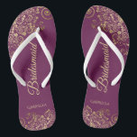 Gold Lace on Cassis Purple Bridesmaid Wedding Flip Flops<br><div class="desc">These elegant wedding flip flops are a great way to thank and recognize your bridesmaids, while giving their feet a rest after a long day. The beautiful design features an elegant design with golden lace frills on a cassis purple, magenta, or berry colored background and fancy gold colored script lettering....</div>
