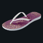 Gold Lace on Cassis Purple The Bride Wedding Flip Flops<br><div class="desc">Dance the night away with these beautiful wedding flip flops. Designed for the bride, they feature a simple yet elegant design with gold colored script lettering on a cassis purple, magenta, or berry colored background and fancy golden lace curls and swirls. Beautiful way to stay fancy and appropriate while giving...</div>