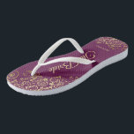 Gold Lace on Cassis Purple The Bride Wedding Flip Flops<br><div class="desc">Dance the night away with these beautiful wedding flip flops. Designed for the bride, they feature a simple yet elegant design with gold colored script lettering on a cassis purple, magenta, or berry colored background and fancy golden lace curls and swirls. Beautiful way to stay fancy and appropriate while giving...</div>