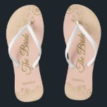 Gold Lace on Coral Peach The Bride Elegant Wedding Flip Flops<br><div class="desc">Dance the night away with these beautiful wedding flip flops. Designed for the bride, they feature a simple yet elegant design with gold colored script lettering on a light orange or coral peach colored background and fancy golden lace curls and swirls. Beautiful way to stay fancy and appropriate while giving...</div>