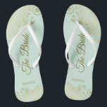 Gold Lace on Mint Green The Bride Elegant Wedding Flip Flops<br><div class="desc">Dance the night away with these beautiful wedding flip flops. Designed for the bride, they feature a simple yet elegant design with gold colored script lettering on a light neo mint green colored background and fancy golden lace curls and swirls. Beautiful way to stay fancy and appropriate while giving your...</div>