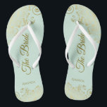 Gold Lace on Mint Green The Bride Elegant Wedding Flip Flops<br><div class="desc">Dance the night away with these beautiful wedding flip flops. Designed for the bride, they feature a simple yet elegant design with gold colored script lettering on a light neo mint green colored background and fancy golden lace curls and swirls. Beautiful way to stay fancy and appropriate while giving your...</div>