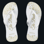 Gold Lace on White The Bride Elegant Wedding Flip Flops<br><div class="desc">Dance the night away with these beautiful wedding flip flops. Designed for the bride, they feature a simple yet elegant design with gold colored script lettering on a white background and fancy golden lace curls and swirls. Beautiful way to stay fancy and appropriate while giving your feet a break after...</div>