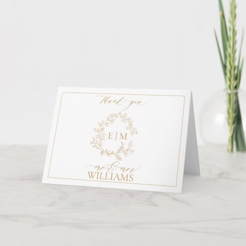 Gold Leafy Crest Monogram Photo Thank You Card - We're loving this trendy, modern gold photo wedding thank you card! Simple, elegant, and oh-so-pretty, it features a hand drawn leafy wreath encircling a modern wedding monogram. It is personalized in elegant typography, and accented with hand-lettered calligraphy. Finally, it is trimmed in a delicate frame. Veiw suite here: https://www.zazzle.com/collections/gold_leafy_crest_monogram_wedding-119668631605460589 Contact designer for matching products to complete the suite, OR for color variations of this design. Thank you sooo much for supporting our small business, we really appreciate it! 
We are so happy you love this design as much as we do, and would love to invite
you to be part of our new private Facebook group Wedding Planning Tips for Busy Brides. 
Join to receive the latest on sales, new releases and more! 
https://www.facebook.com/groups/622298402544171  
Copyright Anastasia Surridge for Elegant Invites, all rights reserved.