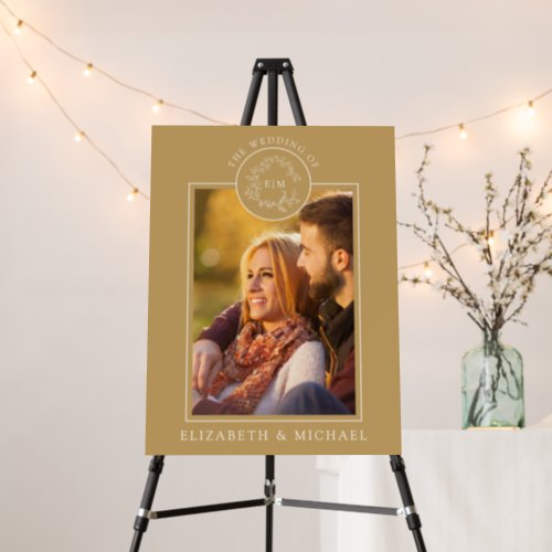 Gold Leafy Crest Monogram Photo Wedding Foam Board - We're loving this trendy, modern gold wedding/reception welcome sign! Simple, elegant, and oh-so-pretty, it features a hand drawn leafy wreath encircling a modern wedding monogram. It is personalized in elegant typography, and your favorite engagement photo. Finally, it is trimmed in a delicate frame. Veiw suite here: https://www.zazzle.com/collections/gold_leafy_crest_monogram_wedding-119668631605460589 Contact designer for matching products to complete the suite, OR for color variations of this design. Thank you sooo much for supporting our small business, we really appreciate it! 
We are so happy you love this design as much as we do, and would love to invite
you to be part of our new private Facebook group Wedding Planning Tips for Busy Brides. 
Join to receive the latest on sales, new releases and more! 
https://www.facebook.com/groups/622298402544171  
Copyright Anastasia Surridge for Elegant Invites, all rights reserved.