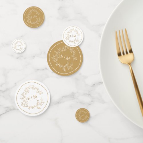 Gold Leafy Crest Monogram Wedding Confetti - Create the perfect reception setting! We're loving this trendy, modern gold wedding table confetti! Simple, elegant, and oh-so-pretty, it features a hand drawn leafy wreath encircling a modern wedding monogram. It is personalized in elegant typography and trimmed in a delicate frame. Veiw suite here: https://www.zazzle.com/collections/gold_leafy_crest_monogram_wedding-119668631605460589 Contact designer for matching products to complete the suite, OR for color variations of this design. Thank you sooo much for supporting our small business, we really appreciate it! 
We are so happy you love this design as much as we do, and would love to invite
you to be part of our new private Facebook group Wedding Planning Tips for Busy Brides. 
Join to receive the latest on sales, new releases and more! 
https://www.facebook.com/groups/622298402544171  
Copyright Anastasia Surridge for Elegant Invites, all rights reserved.
