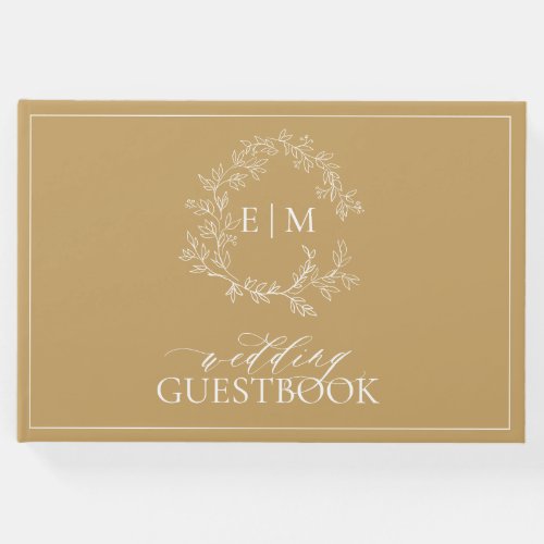 Gold Leafy Crest Monogram Wedding Guest Book - Create the perfect wedding registry with this guestbook. We're loving this trendy, modern gold wedding suite! Simple, elegant, and oh-so-pretty, it features a hand drawn leafy wreath encircling a modern wedding monogram. It is personalized in elegant typography, and accented with hand-lettered calligraphy. Finally, it is trimmed in a delicate frame. Veiw suite here: https://www.zazzle.com/collections/gold_leafy_crest_monogram_wedding-119668631605460589 Contact designer for matching products to complete the suite, OR for color variations of this design. Thank you sooo much for supporting our small business, we really appreciate it! 
We are so happy you love this design as much as we do, and would love to invite
you to be part of our new private Facebook group Wedding Planning Tips for Busy Brides. 
Join to receive the latest on sales, new releases and more! 
https://www.facebook.com/groups/622298402544171  
Copyright Anastasia Surridge for Elegant Invites, all rights reserved.