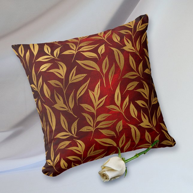 Gold Leaves on Burgundy Red Glow Throw Pillow (Creator Uploaded)