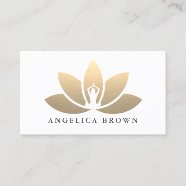 White yoga business card featuring a large gold lotus and centered name
