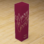 Gold Merry Christmas on Cranberry Wine Box<br><div class="desc">Merry Christmas in a faux gold foil script and your names in chic lettering, these cranberry wine bottle gift boxes are a stylish way to package wine Christmas gifts. MATCHING items in our collection.</div>