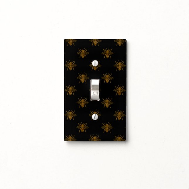Gold Metallic Foil Bees on Black Light Switch Cover (In Situ)