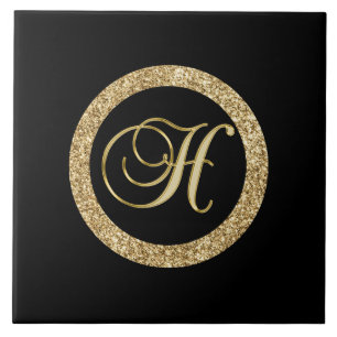 Gold Monogram H on black Ceramic Tile