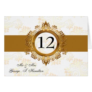 gold monogram table seating card