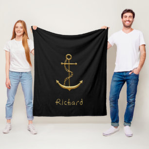 Gold nautical anchor on black custom name fleece blanket