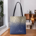 Gold Navy Blue Girly Glitter Sparkle Monogram Name Tote Bag<br><div class="desc">Navy Blue and Gold Faux Sparkle and Glitter Elegant Monogram Book Bag. This Book Bag can be customized to include your initial and first name and given as a gift for Christmas,  Sweet 16 Birthday,  Bridal Shower or a Wedding.</div>