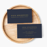 Gold Navy Blue | Minimalist Modern Professional Business Card<br><div class="desc">Simple,  stylish and elegant business card design in modern typography in gold with a clean minimalist design on a navy blue background. The name,  title and contact details can be easily personalized for a unique and professional design statement to enhance your business presence.</div>
