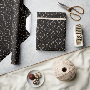Gold pattern on black . wrapping paper