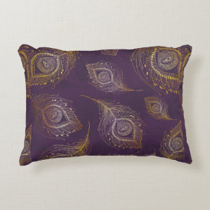 Gold peacock feather in violet background accent pillow
