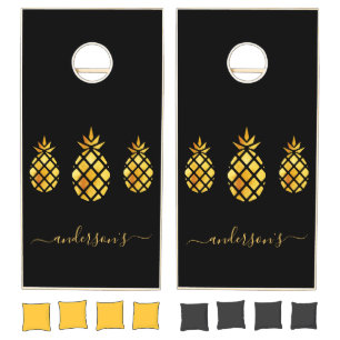 Gold pineapples tropical black family name cornhole set